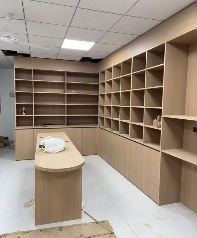 school office is equipped with various storage cabinets - Image 4