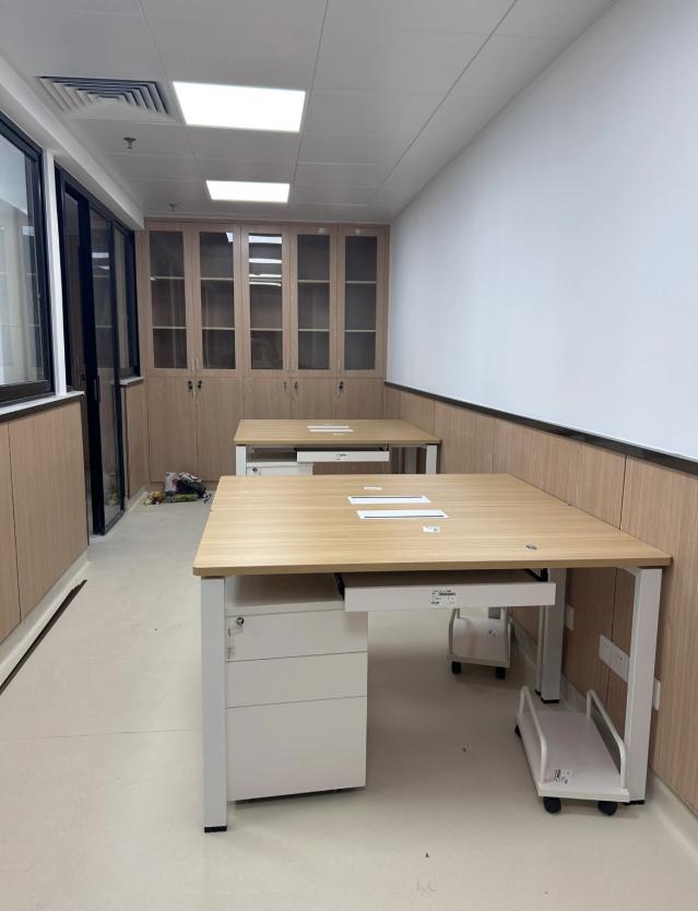 school office is equipped with various storage cabinets - Image 3